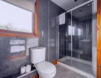sink, plumbing fixture, indoor, bathroom, window, interior, shower, design, tap, mirror, countertop, bathroom accessory, hotel
